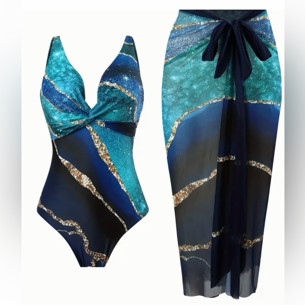 NWOT. One piece swimsuit,cover-up sarong skirt.Ocean print,strap tie,high cut.XL